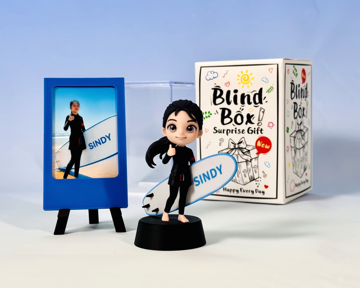 Finished surfer figure, simple photo frame, clear protective case, and basic gift packaging